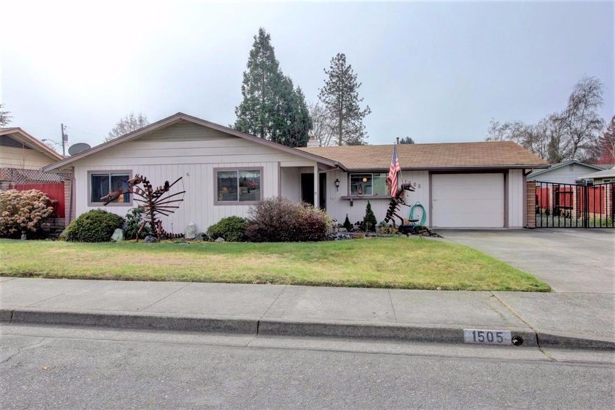 From the curb, this looks like your average subdivision house. But it's not!! This home is wheelchair friendly. The 2nd bedroom has its own en suite bathroom designed completely to be wheel chair accessible. And in addition to the attached one car garage, there is a detached 2 car garage that has been used for many years as a workshop with 220. There is plenty of room for the handy person to work on projects here! There are 2 additional outbuildings with power plus this house has room to park an RV. The yards are low maintenance and the back is completely fenced with a covered patio to enjoy on pleasant afternoons. All in a quiet subdivision not far from Reinhardt All Sports Park. This one won't last long.