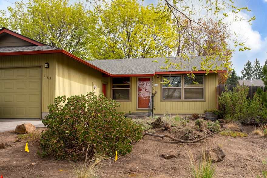 Charming home in the desirable Orchard District. This 3 bedroom, 2 bath home has beautiful laminate wood floors and marmoleum bathroom and kitchen floors. The vaulted ceiling in the living/dining area and the flow into the kitchen contribute to a wide open feel while a solar tube gives extra natural light. The dining area leads to a partially-covered patio with mature big-leaf maples keeping the house cool in the summer. The back yard is fully fenced with a perfect full-sun spot on the side for gardening. Enjoy the low maintenance and water costs of mature xeriscaping in front. The home is very well insulated with updated double-paned windows. The free-standing gas heating stove is connected to the thermostat to easily and efficiently keep the whole home toasty. A double car garage provides plenty of storage. Just a block away from historic Hollinshead Park with large green lawns, a community garden, off-leash dog area and short trails along the canal!
