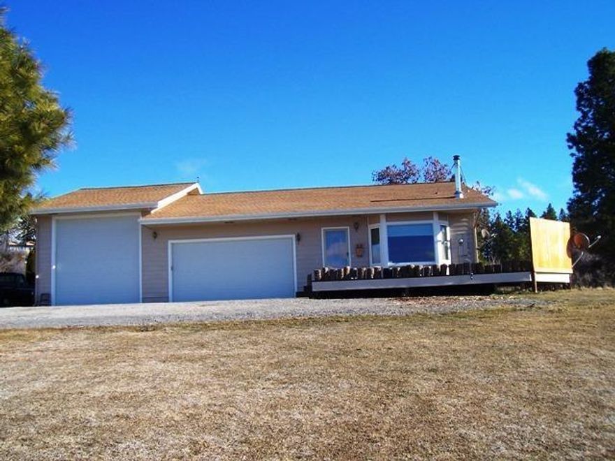 Lake View Home Built In 2005 Pristine Condition Open Floor Plan. Nice Kitchen Hickory Cabinets 2 Bedroom 1 Bathroom With 3 Car Garage Shop, Rv Parking. Home Built In 2005 Sits On Gently Rolling 2 Acres Above Road (Not In A Flood Zone) With Gorgeous Picture Window View Of Lake And Mtns!! Certified Wood Stove. Electric Heat With Different Thermostat Zones. Very Nice Laundry Room Has Lots Of Storage! Totally Fenced & Gated Driveway. Shop Has Long Workbench! Kitchen Also Has Expensive Pantry Cabinet.Previous Owner Took Battery And Motion Sensors For Alarm. House Is Wired For Alarm. Alarm Not Active.