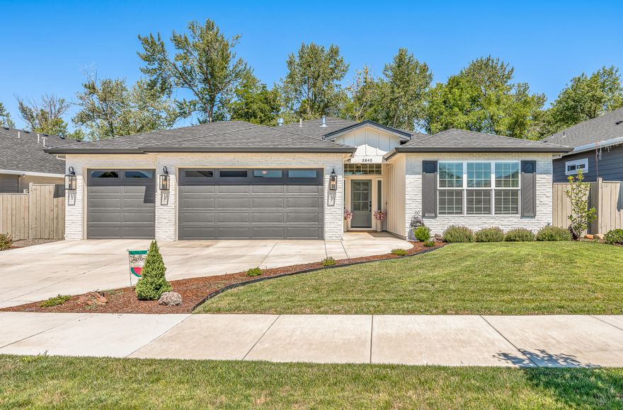 Better Then New! Built in 2020, this contemporary single level 3 bed, 2 bath home is nestled in the sought-after Stonegate Subdivision, convenient to shopping, schools, walking paths, & parks. Beautifully appointed w/luxury systems & upgrades throughout including hardwood floors, ceiling treatments, gas fireplace w/mantle & designer lighting. Spacious kitchen open to the living room & dining area w/a center island, oversized farm sink, ss appliances, quartz countertops, white tile backsplash, & huge walk-in pantry w/a glass door entry, built-in cabinetry, & microwave nook. Large primary suite featuring a spa-like ensuite w/a barn door, dual-sink vanity, oversized tile shower w/sitting bench, tile floors, & walk-in closet. Dedicated laundry/mud room w/built-in cabinetry & a distinctive tile floor. Fully fenced w/lots of privacy, mature, easy-care landscaping, covered patio, & NO neighbors behind! 3-car garage w/room for storage plus a TESLA Electric Vehicle Charging Station.