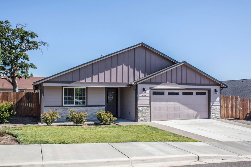 Large RV Parking in desirable Eagle Point neighborhood!! This 2016 built true 4 bedroom 2 bath home sits on a .20 acre lot.  Spacious open floor plan, vaulted ceilings with planter shelf and laminate floors running throughout the main living spaces. Kitchen features an eat-in breakfast bar, knotty alder cabinets, granite countertops, and all stainless steel appliances stay. Nice sized master bedroom with ceiling fan, walk-in closet, and master bath with dual sinks.  Covered back patio with gas BBQ stub takes you out to your large backyard to enjoy views of Mt. McLoughlin from a separate back deck all fenced and landscaped with timed sprinklers.  Finished 2 car garage with 220 outlet, upgraded fiber optic lines, smart thermostat and ring door bell.