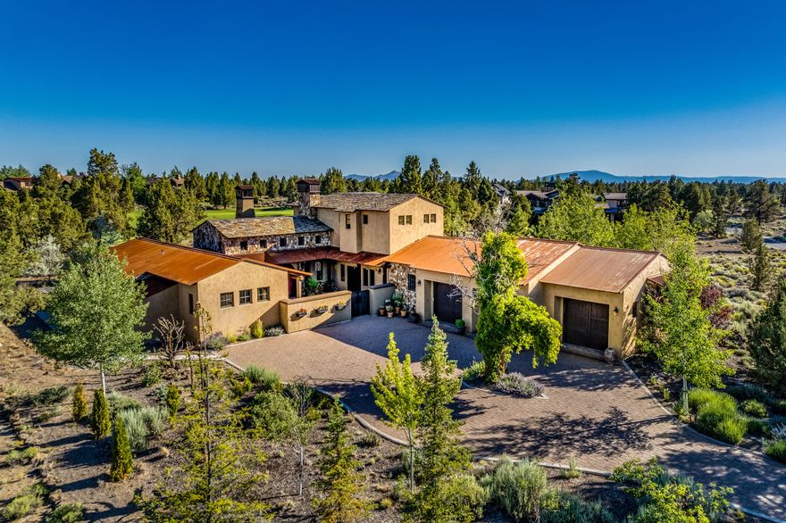 This beautifully appointed Estate Property at Pronghorn affords European style architecture in a private setting. Located on the 2nd Fairway of the Award Winning Jack Nicklaus Signature Course, this welcoming floorplan takes full advantage of indoor and outdoor spaces in a flexible layout. 

Three full suites offer large and luxurious accommodations in all bedrooms. A large and spacious Country Kitchen opens to the Great Room and Dining Area. An east facing courtyard and west facing deck provide plenty of options for outdoor entertaining and indoor/outdoor living at its finest. Large, 3-car garage for all of your toys, along with a bonus office space really make this home check all the boxes. The unique finishes and details of this home deserve to be seen in person to be truly appreciated.