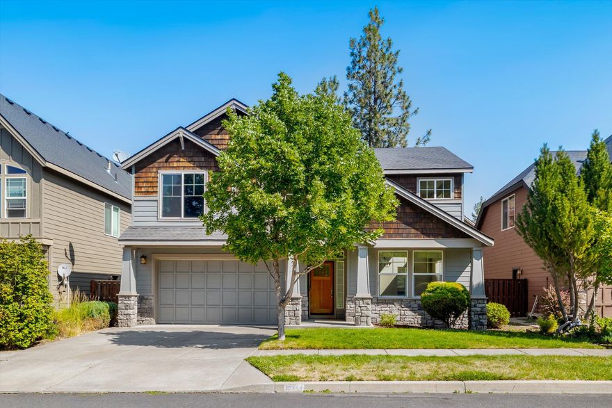 This beautiful SW Bend home features updated LVP flooring and fresh carpet throughout, complementing the recently modernized kitchen and primary suite. Grand vaulted ceiling greets as you enter, leading into a spacious living area. Open-concept kitchen, showcasing SS appliances, quartz countertops, and a central island, flows into a second living space with a cozy fireplace and custom built-ins. Laundry room is conveniently located upstairs with all bedrooms. Primary suite includes a bonus room, large walk-in closet, and an updated bathroom with a tile shower and soaking tub. Outdoors, enjoy the privacy of a treed backyard with a paver patio, new sod, and plenty of space to relax or play. River Canyon Estates offers a community pool, clubhouse, fitness center, and tennis court. Ideally located near parks, river trail access, Brookswood Meadow Plaza, grocery, restaurants, and schools, this home blends modern updates with the convenience of nearby amenities. You can have it all!