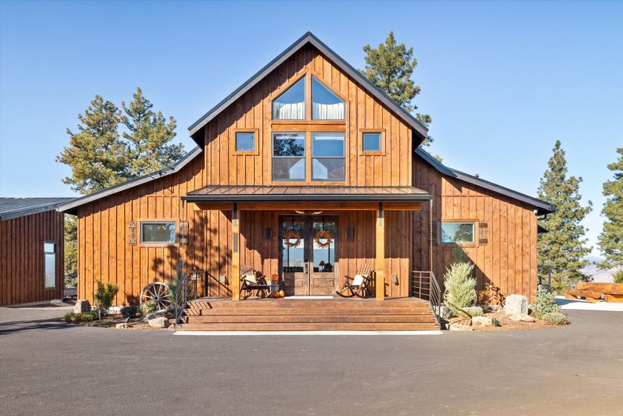 Imagine walking thru the glass French doors & looking directly at Green Ridge & Mt. Jefferson. That's exactly what you & your guests will experience on the front porch of this truly custom-built home. The expansive views are just the beginning of this amazing story of quality, comfort, style, class, indoor & outdoor entertainment at its finest. From the professional landscaping throughout the property to the fully paved circular driveway, to the welcoming porch w/ the expansive views as you enter, to the wall of windows West facing, to the chef's kitchen w/custom cabinets/SS appliances/generous island/pass thru windows to back deck entertaining space---you cannot imagine all the extras this home has incorporated so seamlessly into it's layout. 8.8 acres custom home, shop, & out-door entertaining spaces make this property feel like a 5-Star get away! Please read the attached Amenities Sheet for additional details regarding this outstanding one-of-a-kind 3Rs property.