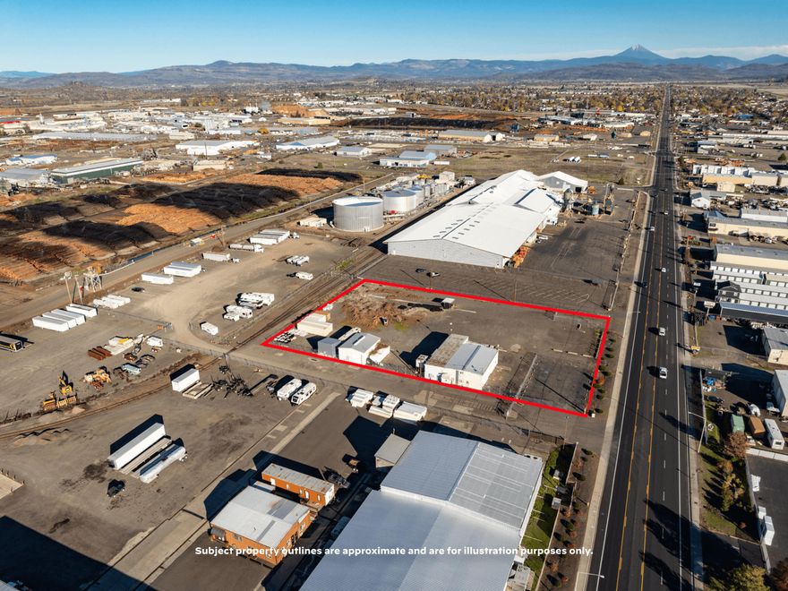 Exclusively presented for sale - 1405 Antelope Road, a highly visible and well-located industrial site in White City, the heart of Southern Oregon's industrial market (the ''Property''). The Property spans a rectangular 2.00 acre parcel, and includes ~5,700 SF of warehouse space across two buildings, with two dedicated driveways off of Antelope Rd (1 shared). Both buildings are steel-frame, clear span structures, and appear to be in good shape; multiple 10-14' overhead doors, office space, restroom, and ~300 SF mezzanine. Property is currently leased through 2030, but early term. is possible depending on buyers needs. Additional private, dedicated paved and marked parking lot serving the relatively large yard and buildings. Fully perimeter fenced and multiple rolling gates. Adjacent 2.54 acre to the rear is also available - contact brokers or see attached documents for more info!