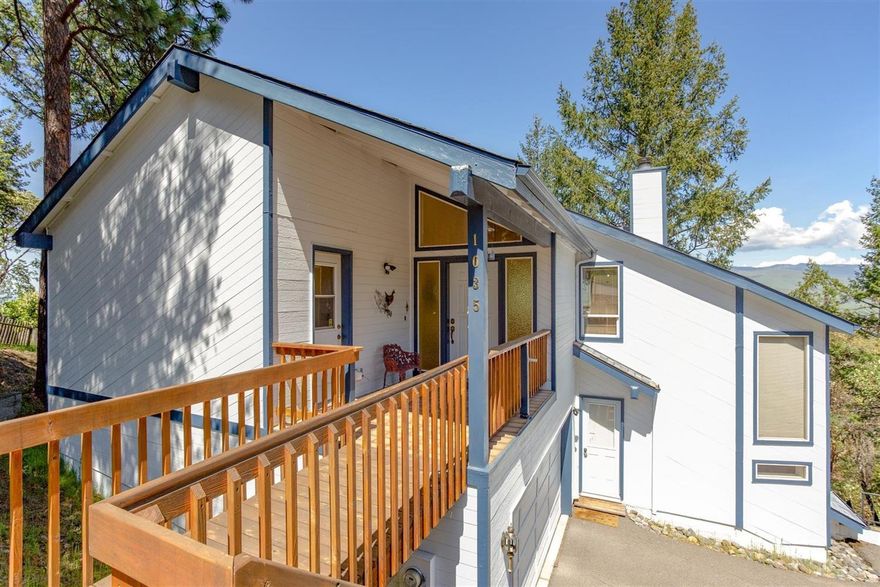 Fantastic Views Overlooking Ashland and Grizzly Peak! Super Park Estates home with open concept living/dining/kitchen, vaulted ceilings, wood-burning fireplace, spacious euro-style kitchen with expansive cabinetry, large eating bar, work island, pantry and an extra large deck to enjoy the Ashland views. Separate Master suite with large soaking tub, shower and double basins, two more good-sized bedrooms, full bath and family room on the bottom level. Double car attached garage, great storage, updated roof, exterior paint, furnace and water heater. Next door is a 1/3 acre buildable lot also available to purchase separately or as a package. Enjoy life in the trees, yet close-in to Ashland's world-class amenities.