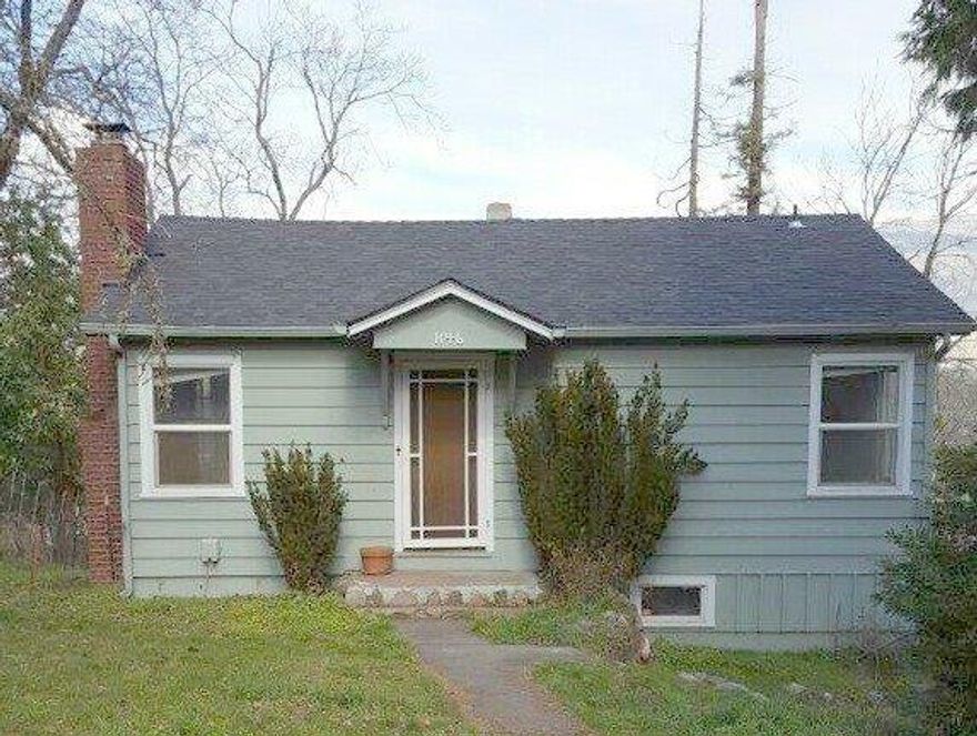 1950 Charming Cottage with beautiful views!!! LOTS of potential for this existing 1 bed, 1 bath, approx. 672 sqft., with beautiful fir floors under carpet, full basement/garage. Corner 0.18 ac. lot which gives a wonderful spacious feeling. Sellers have started the process with the city of Ashland planning department, to expand the footprint of the existing home, plans have not been finalized. Buyers to do their own due diligence with the city. This is a great opportunity!!!