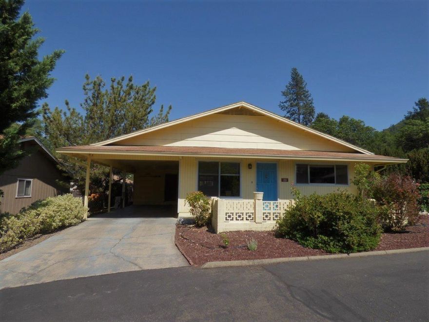 A gem in Brookside 55+ Village in Rogue River.  2 bedrooms, 2 baths, open floor plan, with new high-end durable wood-grain vinyl flooring in kitchen and living room, and porcelain wood-grain tile in hall and both baths. Ductless air and heat HVAC with additional radiant heat in ceilings.  Kitchen has a pantry, dishwasher and a door to the carport for out-of-the-rain entry and exit.  Primary bedroom has a private bathroom with a walk-in shower, and hall bath is available for guests.  Low maintenance front and side yards. Storage room at end of carport.  Use of Clubhouse and fenced sparkling pool.  HOA fees $102/month include water, sewer and maintenance of common areas, pool and clubhouse.  Close to downtown, shopping, library, bus service, recreation and the Rogue river.
