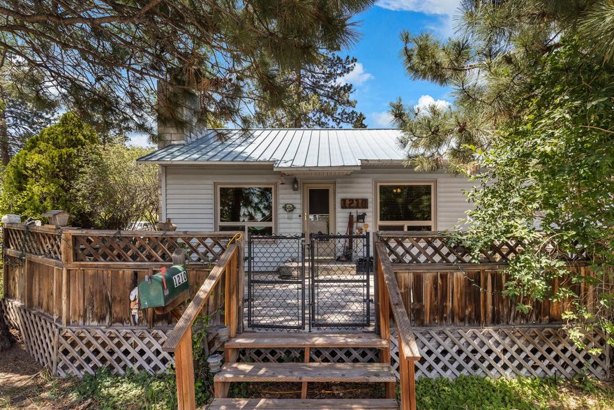 Location Location Location! This property is set in a highly desirable area where you can almost smell the hops from the breweries.  Walking  and biking distance to downtown, Old Mill or Northwest Crossing.  Sourround by restuarants, pubs, shops, parks, and the world famous Deschutes River. This home was built in 1919 with numerous original items.  Needs TLC to make it into your dream home or investment property. Turn the old garage into ADU and enjoy twice the space.