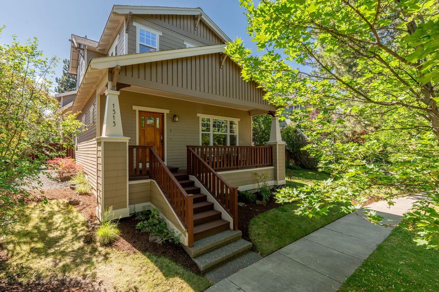 Located in the heart of Bend's coveted Northwest Crossing, this thoughtfully designed home offers timeless charm, quality craftsmanship, & versatile living. The main residence features 3 bedrooms, 2.5 bathrooms, & an open-concept floor plan filled with natural light. Hardwood floors, a cozy gas fireplace, & a spacious kitchen with a center island & pantry create a warm and inviting atmosphere. Upstairs, the primary suite includes a walk-in closet, dual vanities, & a soaking tub. Tucked above the garage with a private entrance, the detached ADU offers a 1-bedroom, 1-bathroom apartment—complete with a full kitchen, gas fireplace, & laundry—perfect for guests, extended family, or income potential. Enjoy quiet evenings on the front porch or explore all that Northwest Crossing has to offer just blocks away: trails, parks, shops, and restaurants. With a two-car garage, alley access, & beautiful curb appeal, this property is a rare find in one of Bend's most beloved neighborhoods.