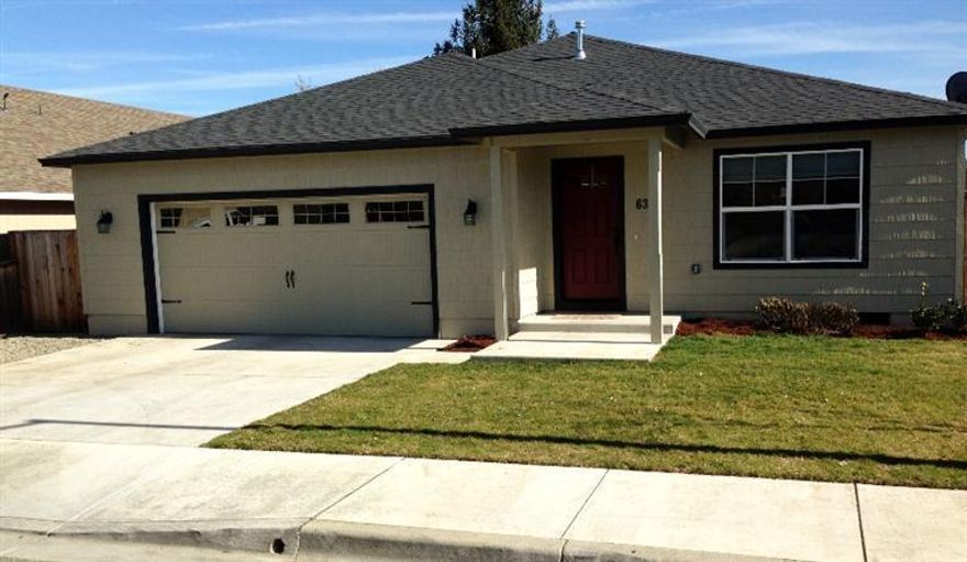 This is a like-new home in a wonderful, low traffic Central Point neighborhood! Well cared for and move in ready. The amenities include stunning granite counter tops, stainless appliances and tile floors in the kitchen, dining room, laundry and both baths. The high vaulted ceilings with stylish fans and the large window package offer a feeling of light, bright and open space. The separate formal dining room is in addition to the eating bar in the kitchen, adjacent to the living area. Located just minutes from the schools and downtown area, and the city parks.