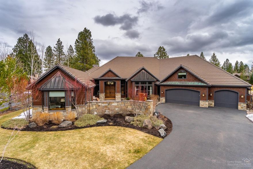 The first impression of this property is that of grand elegance and remarkable attention to details. The home is situated on the half acre site to take in views and to enjoy morning and afternoon sun. From the paver courtyard as you enter to the large patios and fire pit facing east, private south facing patio entrance off master and lovely upstairs balcony you can enjoy golf course views. The interior dazzles with formal living spaces enhanced with character hickory flooring throughout. Arched and coved ceilings details, lovely views of the first fairway & windows that bring the outdoors in. The great room, kitchen dining area and breakfast bar open to large covered patio to make entertaining easy. The master retreat was designed as a peaceful sanctuary in its own wing & includes a private sitting area with cozy fireplace, generous walk in closet, lovely master bath. W/ the large library/office, upstairs bonus, 2 guest suites, 3 car garage, this home exudes craftsmanship and warmth.