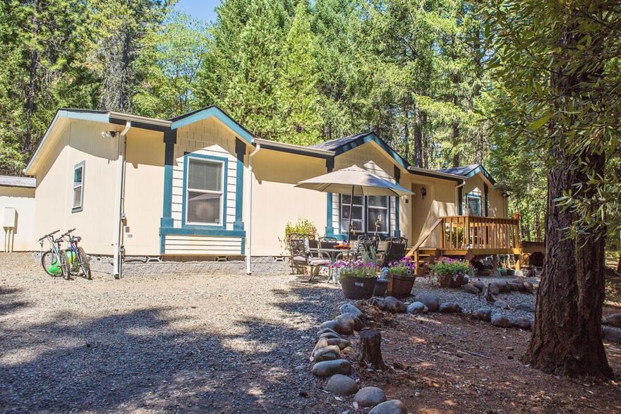 Magnificent triple wide Palm Harbor that has been upgraded and customized with new wood flooring, new paint and many features you will notice in this customized home. Terrific location in O'Brien with large marketable timber around home site.Deatched shop, detached dbl car garage and storage areas are a few of the many amenities. Sellers are motivated to move to their new home. Only 50 minutes to the Oregon coast and easy access to Grants Pass too. Fenced acreage, new front deck on home and play structure included. Great garden area on this park-like 3.15 acre site. Truly a serene quiet location in the Illinois Valley.