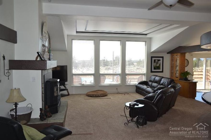 Awesome views of the Cascade Mountains & Smith Rock. Enjoy the sights from the 1800 sq. ft. deck including some of the most beautiful sunsets in Oregon! Walk inside to the wonderful 3 bd, 2 bth + Office home. New carpet & flooring throughout. Beautiful kitchen with island, breakfast bar, cabinets galore and walk in pantry. Set up for entertaining, outside there's a Horseshoe pit, water feature, extra deep double car garage, 48x30 shop w/ 2, 8' garage doors w/ elect openers, 12' slider door, + 24x22 lean-to