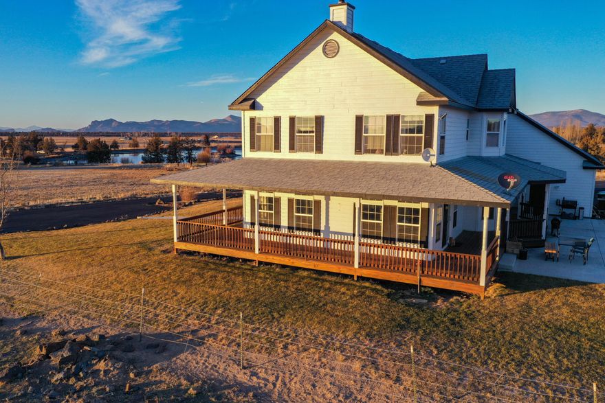 Spectacular panoramic views of the Cascade Mountains and Smith Rock at this desirable Powell Butte ranch in the heart of Central Oregon. The beautiful ranch style home, with wrap around porch, sits on 98 acres of productive ground and has 64 acres of irrigation rights. Two ponds for excellent water fowl hunting, a large private lake with access right out your front door for trophy bass fishing! Many upgrades to this 4 bed/3 bath home; newly paved road/driveway, exterior paint, new roof (paid for and to be installed in April), many kitchen upgrades makes it perfect for entertaining. Infrastructure includes a shop, hay barn, two car garage. This property is low cost flood irrigated for your livestock or haying operation, fenced and cross fenced for easy rotation, handy working facility to sort and process. Live, work and recreate on your own 98.5 acre playground with all the conveniences having Bend, Redmond and commercial flights only minutes away. Start living the wonderful dream!