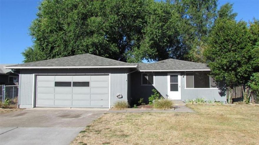 Home shows beautifully!...has been remodeled and updated throughout! New flooring, counter-tops, paint, doors, light fixtures and more! Includes refrigerator! 2 car garage, nice sized fenced yard w/ mature trees that backs up to the school! Qualifies for USDA financing!