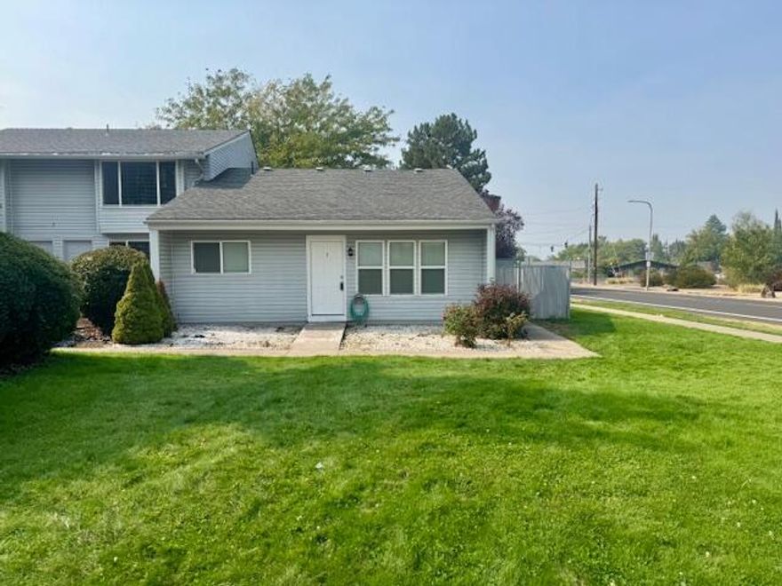 Enjoy added privacy and extra natural light in this desirable corner unit single story condo. Recently fully gutted and remodeled, this home showcases new flooring, fresh interior paint, updated cabinetry, and stainless steel appliances. Featuring vaulted ceilings and an open layout, the space feels bright and expansive from the moment you walk in. A brand-new HVAC system ensures year-round comfort, while the fenced yard offers a rare outdoor retreat, perfect for relaxing or entertaining. Located in a peaceful, well-kept community, this low-maintenance home blends comfort, style, and convenience. The HOA includes water, sewer, garbage, front yard and surrounding grounds landscape maintenance, building insurance, and exterior repairs (buyer to confirm). A great opportunity for easy living in a prime location.