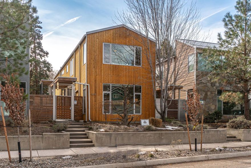 Enjoy this Fully Furnished Grandfathered Short Term Rental in the heart of Bend's Westside! The location of this home is moments from shopping, restaurants, parks and bike trails right outside your front door. This home features radiant heated concrete floors, solid wood doors, gas appliances & fireplace. You will find the Kitchen & Living spaces allow for endless opportunities to entertain. The second floor Primary allows for tree top living with a private patio and boasting a very generously sized bathroom including a soaking tub with cheerful subway tiles in the bathroom. The side yard landscaping has turf grass, a BBQ area, along with built -in seating which is a delight for year round use. The home has a proven two year record of $86K-$90k+ annual gross income! This would be an easy transition for a new investor to take over this fantastic property. Call today for a private tour!