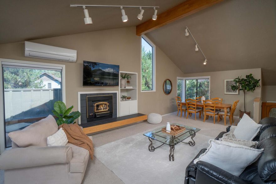 Welcome to your Sunriver basecamp! Ideally located just a short walk or bike ride to Lake Aspen, SHARC, and The Village, this 4-bedroom, 3.5-bath home offers the perfect blend of comfort and room for everyone. The light-filled great room with a woodstove creates a welcoming gathering space, while the kitchen features granite counters, stainless steel appliances, and an island for effortless entertaining. The primary suite enjoys privacy upstairs, with 3 additional bedrooms, a family room, and sunroom on the lower level. Multiple composite decks provide inviting spaces to relax and enjoy the outdoors. Recent updates include new exterior paint (June 2025) and a new roof (October 2025). Complete with a two-car garage and workshop, Mitsubishi cooling system, and turnkey furnishings, this thoughtfully designed retreat is ready for years of memories in the heart of Central Oregon. Create your Sunriver legacy!