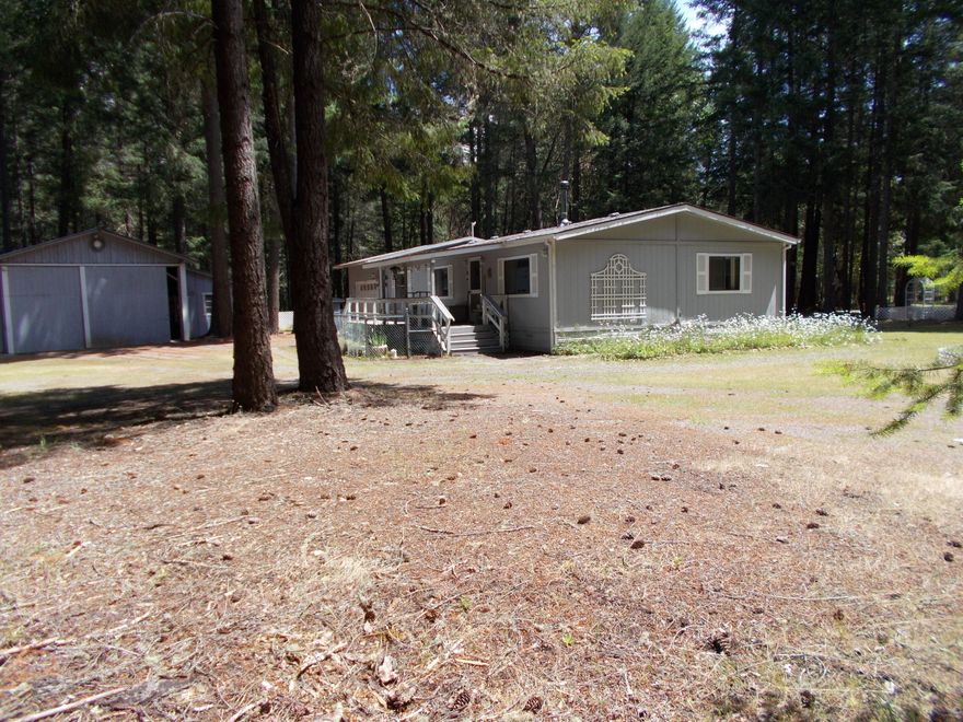 Really beautiful private acreage with woods and meadows. Well cared for home with multiple buildings. This home and property have so much to offer!