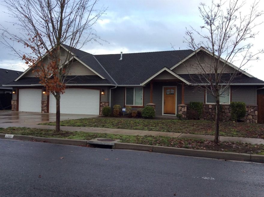 Make this your new address for 2016! One owner home. Beautiful exterior home using rock accents. Located area similar homes in Lynne Anne Estates. Move in condition. Home built in 2006 by Northridge construction. Three bedroom two bath 1525 sq ft. home with attached 3 car finished interior garage. Vaulted ceilings main living area and master. Great separation of space from master to other bedrooms. Kitchen has granite countertops and stainless steel appliances. Dining area. Living room with plants shelves & ceiling fan. Master bedroom has recessed area for collectables and wired for mood lighting. Master bath double sinks built in cabinet for linens. Large walk in closet with shelving and clothes racks. Hall bath has double sinks with vanity storage. Outside is covered concrete patio great for entertaining. Alongside garage area for parking utility trailer, boat or small RV/Travel trailer/plug in for RV. Central heat air keeps home comfortable. Owners Licensed RE Brokers.