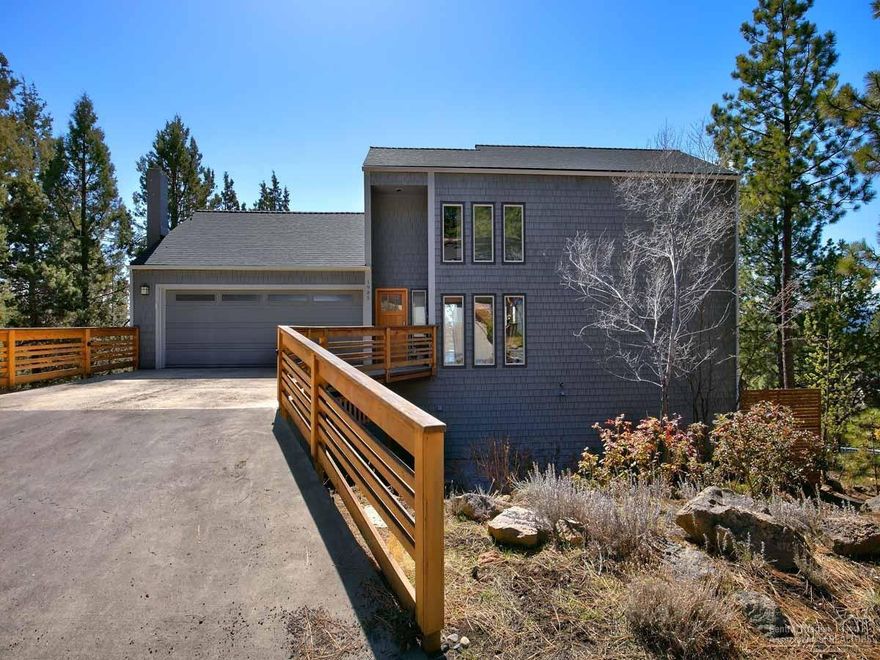 Ever dream of enjoying a house that is open, light and bright, yet feels like being in a first class tree house? This renovated West Hills home is just minutes from everything. Views of the Paulinas from the living area and the Cascades from the upstairs master bedroom. Great room floor plan with a cozy sunroom. The lower level offers space for guests or kids to call their own. With multiple decks, a hot tub, oversized 2-car garage and a new roof, it promises to be the ideal home for a busy family.