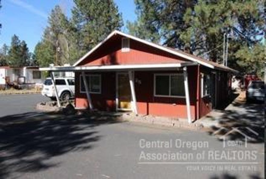 Rare opportunity to purchase Mobile Home Park close to Bend on open market. The park has 28 spaces with steady rental income consisting of 21 manufactured homes paying space rent of $475 or $560 depending on lot size, 6 RV on a permanent basis paying $420 and $440, and a studio apartment paying $1100. included in the sale is the assumption of 2 Park owned mortgages consisting of monthly payments of $374.41 and $338.33.