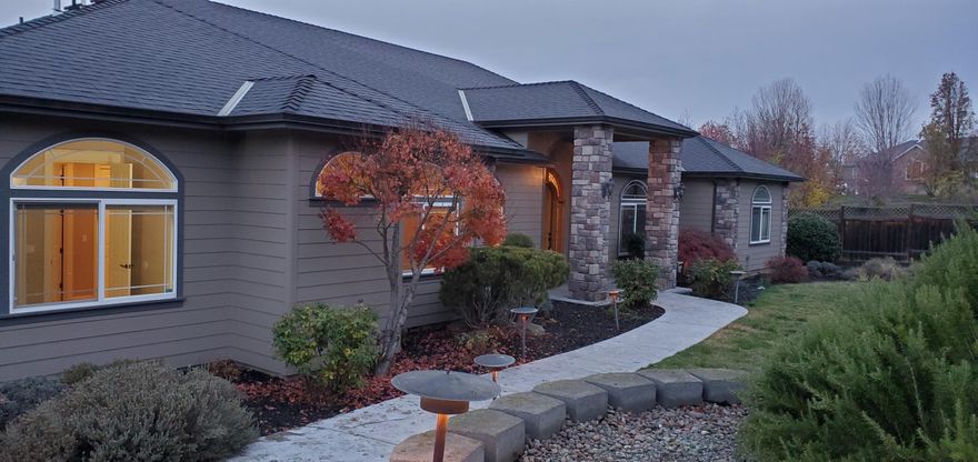 Bring your RV, car collection, or workshop dreams to this 2200sq ft shop (appx. 48'x46'). Expansive fully finished shop (insulated/drywall/tape/texture/paint) with skylights, heat, AC, welding room, bathroom and office. with 8ft  and 14ft rollup doors . The amazing home boasts its own three car garage, Four bedrooms, or three and an office off the living room, extensive crown molding and coffered ceiling in dining area. Open floorplan accesses the covered patio with built in BBQ and a gardeners oasis of pathways and raised beds overlooking a gorgeous neighboring  vineyard. Double vanities in the primary ensuite bath and two walk-in closets. The list goes on - Hardwood floors, built in vacuum system, HUGE pantry, Gas cooktop in center island with seperate counter seating. Absolutely a wonderful home for entertaining.  Dont let this one get away!