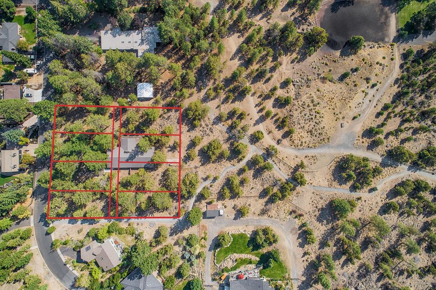 Development Property or Estate Homesite in the HEART of Bend! 8 legal lots of record sitting on a 1.08 tax lot in NW Bend. Heirloom estate parcels like this rarely hit the market, and this is one of the finest developable parcels that remains in all of Bend! Mid-century charm radiates from the existing estate home, which could be renovated into a designer masterpiece! Ideal for builder/developer to create 8 buildable tax lots, with the 4 western lots backing Hillside I Park and the 4 eastern lots fronting the prestigious Eastes Street. Mature pines and landscaping provide the true ''NW Bend'' feel.