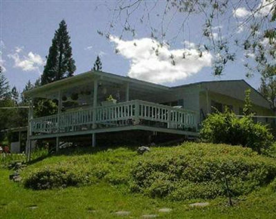 Secluded Country Setting With Gardens Galore. Cheerful Home With Big Family Room. Barn/Shop Has A Concrete Floor. Screened Cabana Is Seperate From The House.Large Covered Deck With Awesome Views. Backs Up To Blm 2nd Agent Ruth Caro 582-4616