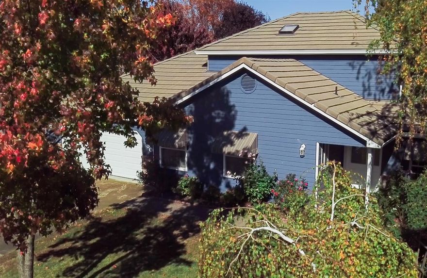 This rare 4 bedroom, 3 bathroom home has nearly 2,000 square feet of living space and is located on a quiet cul-de-sac in Central Point in the Jackson Creek Estates subdivision. Inside, you'll find an elegant formal living room with a gas fireplace and plenty of windows to welcome in the sun and bring in lots of natural light! The galley style kitchen/dining room offers loads of built in cabinetry and pull-outs to hold all your pots, pans and kitchenware. French doors open up to well-groomed backyard with a covered patio, fenced garden area and 2 additional patio areas perfect for entertaining! The home has 2 stories and an innovative floor plan where the master bedroom is conveniently located on the main level. There is an additional bedroom and full bath located off the kitchen area that would be a great space for in-laws or hosting guests. On the second level you will find 2 additional bedrooms and a full bathroom. Come and tour this home today!