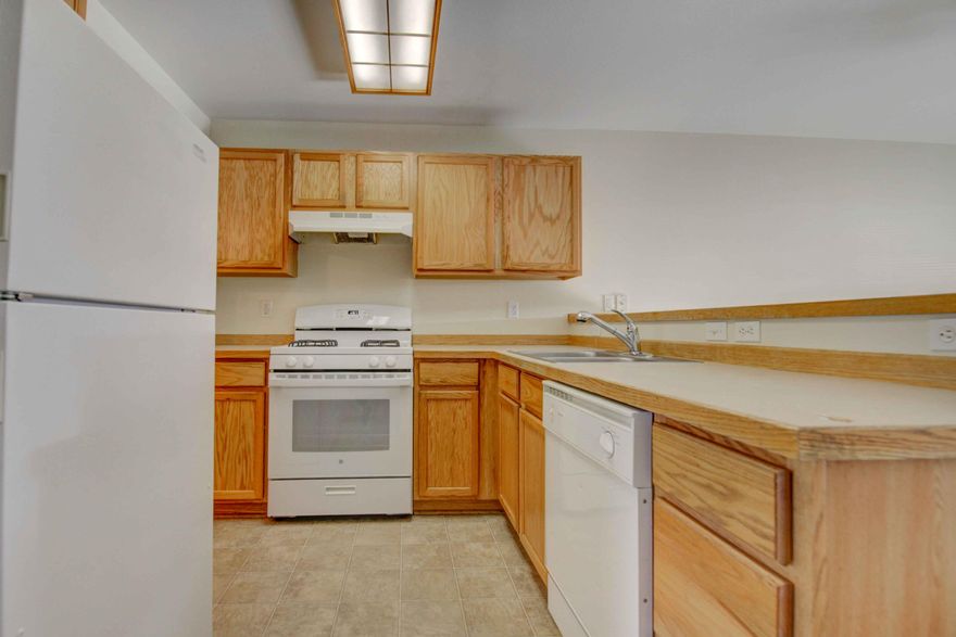 Two-story condo with bedrooms upstairs and one bathroom.  One bedroom has a private balcony.  Living room, kitchen, eating area, back patio, storage, half bathroom, and laundry on the main level.  HOA fee includes the City of Redmond water / sewer / garbage, exterior maintenance, and road / parking maintenance.