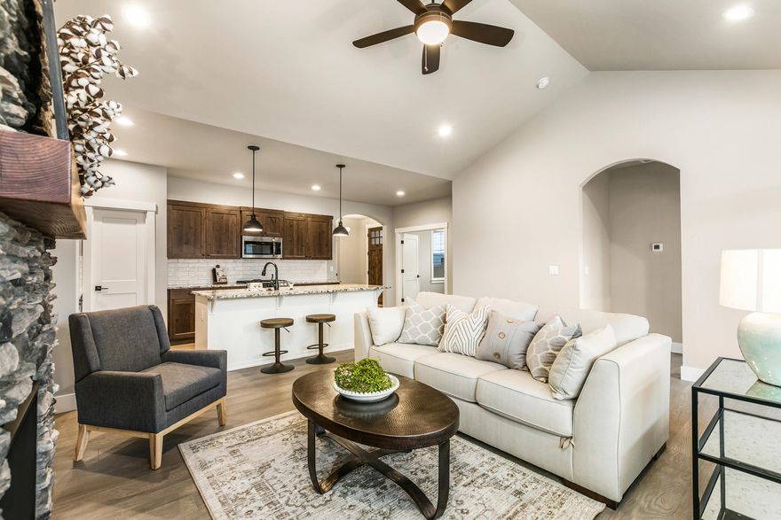 Welcome to Prairie Crossing, a neighborly well-designed community distinguishing itself from the ordinary. A community not only built with
quality, but efficiency. The Sedgewick is a single level 3 bed, 2 bath or 2 bed with den/office floorplan.
Master suite separation with floor to ceiling tile and heated floors. Like all homes in Prairie Crossing home includes landscaped front and back yard, fully fenced
with covered back patio. EA Certified, Central AC, tankless hot water tank with recirc pump, under-mount granite kitchen sink, hard wood floors, 9' - 10' ceilings,
8' front door. Fully finished garage and so many more details. Community Park, Pavilion and Dog Park. See the difference at Prairie Crossing! Directly N of
Ridgeview HS and W of Canal.