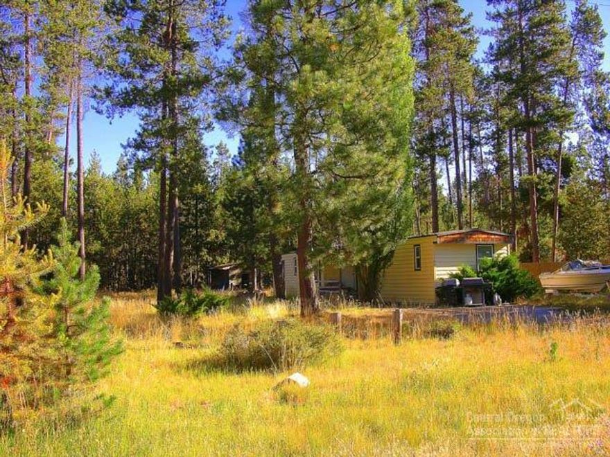 Half Acre Home Site in Oregon Water Wonderland! This improved lot has Power, Water & Sewer hooked up on the property! Owner Will Carry Contract to qualified Buyer! There is an existing dwelling sold as-is as is the property.