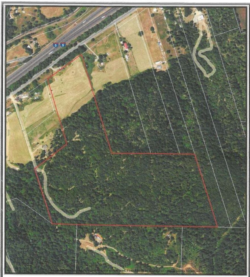 Acreage, water rights, good well and a nice home...all that at an affordable price, too! Can you imagine owning approximately 49 acres with a nice blend of open space and forest? This 1993 double wide manufactured home features a comfortable floor plan with Living Room, Dining Area, Kitchen with center island, nice cabinetry, stainless sink, dishwasher, range/oven and refrigerator! The three Bedrooms, 2 Baths includes a Master Suite with tub/shower in the Master Bathroom and a shower in the Main Bathroom. A nice deck, established garden area, good well (25 gpm when drilled), old, established water rights, and forest with trails to enjoy nature and your own private space. A rare find... call today to own your piece of Southern Oregon.