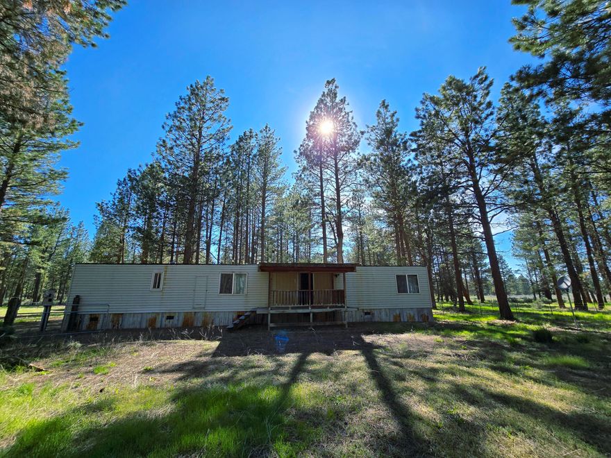 This charming two-bedroom, one-bath mobile home on  Sprague River  in Sprague River, Oregon, offers a serene retreat on 19.84 acres of fenced land. Zoned EFU-CG, the property features outbuildings and a designated garden area, perfect for cultivating your green thumb. The natural flowers and abundant light enhance the property's beauty, providing a peaceful atmosphere.

Sprague River is a delightful small town known for its stunning landscapes and friendly community. Surrounded by nature, it's an ideal spot for outdoor enthusiasts. The property is conveniently located near Klamath Falls, just a short drive away, offering access to amenities and services. Other nearby towns provide additional charm and attractions, making this location perfect for those seeking a blend of tranquility and community. Whether enjoying the expansive outdoor space or exploring the vibrant surrounding towns, this property is a wonderful opportunity for a serene lifestyle in Oregon.