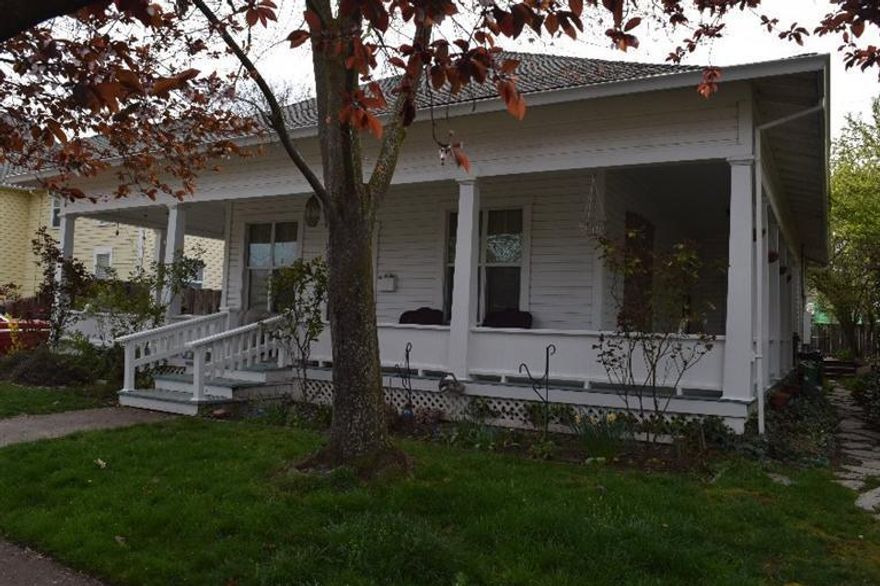 Craftsman style duplex with a large wrap around covered porch, and a fenced backyard on a quiet W Medford Street. This is a solid rental duplex with great rental history. The front unit is larger with 2 bedrooms and 1 bath and indoor laundry. It is currently rented for $725./ month by the same tenant for the last 7 years. The smaller adorable unit in back has 1 bedroom and 1 bath and is currently rented for $500/mo. Total monthly income is $1225. Annual gross income is $14,700. There is a fenced backyard and a deck off the back unit. Both units are in good condition.