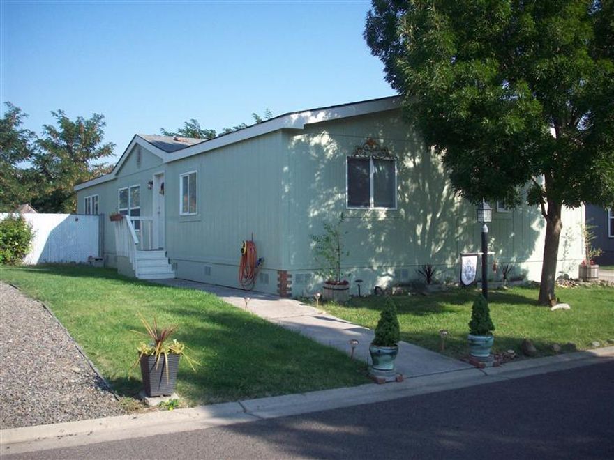 Amazing describes this completely remodeled 4 bedroom, 2 1/2 bath split floor plan home. Brand new kitchen with bamboo hardwood floors, stainless steel appliances including sink and refrigerator, granite countertops. New 1/2 bath added . Other baths redone including ceramic title,basins. All new floor coverings , designer lighting thru out. Interior walls textured and painted. Exterior painted. Too many extras to list. Private back yard with koi pond. Storage unit, Park has nice clubhouse, additional parking for guests. You will fall in love and recognize the top quality and tasteful remodel that has gone into this home.