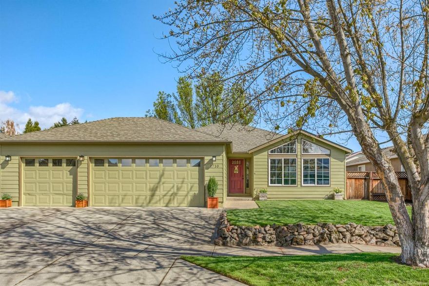 You will love this beautifully remodeled single level home in a great neighborhood. Designer colors, arched doorways, vaulted ceilings and rich materials have recreated this home to one that is stylish & uplifting. Large spacious vaulted living room with newer carpet and large picture windows opens to the remodeled kitchen & dining room. The kitchen is gorgeous with white cabinets, gleaming new stainless appliances including solid slide top gas range, dishwasher & double cast iron sink, slab granite, dining bar & Travertine backsplash. The master has coffered ceiling, walk in closet & remodeled bath with tile floor, granite counters, tile backsplash and rain head shower. Second remodeled bath for 2nd and 3rd bedrooms. Nice laundry room with folding counter. Spacious fenced rear yard with covered patio & large lawn areas, front & rear are fully sprinklered. Gas furnace with central AC. Vinyl windows & 3 Car Garage! Near schools which works great as large playground.