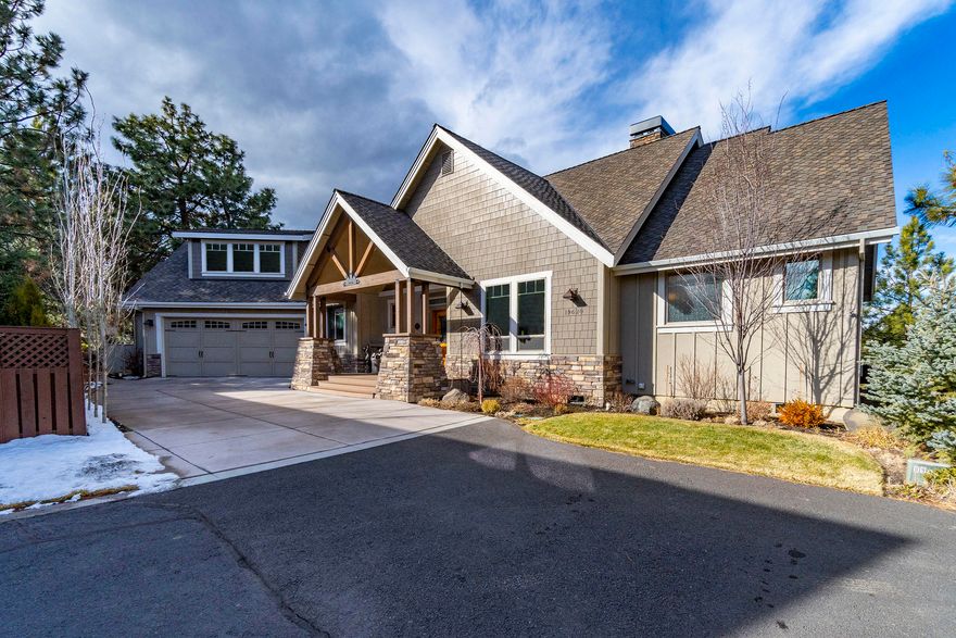 Custom built classic luxury perched above the majestic Deschutes River. Enjoy the sounds of the river rushing below from the comfort of your backyard while watching bald eagles and osprey soaring above the canyon and deer meandering through the trees. Step inside onto new wide plank, hand-scraped hickory engineered wood flooring. Abundant natural light provided by floor to ceiling windows trimmed in solid alder wood extending to the kitchen cabinets and interior doors. Main level living includes the master bedroom, office, and large laundry room. Fireplaces add warmth and ambiance to both the family room and master bedroom. Two bedrooms, each with private deck access, a full bath and spacious bonus room upstairs. Entertain on the covered deck and impress guests with your cooking skills using the built in Traeger. This incredible home is in the vibrant community of River Canyon Estates boasting river trails, parks, clubhouse, pool, tennis/pickle ball court and amazing neighbors!