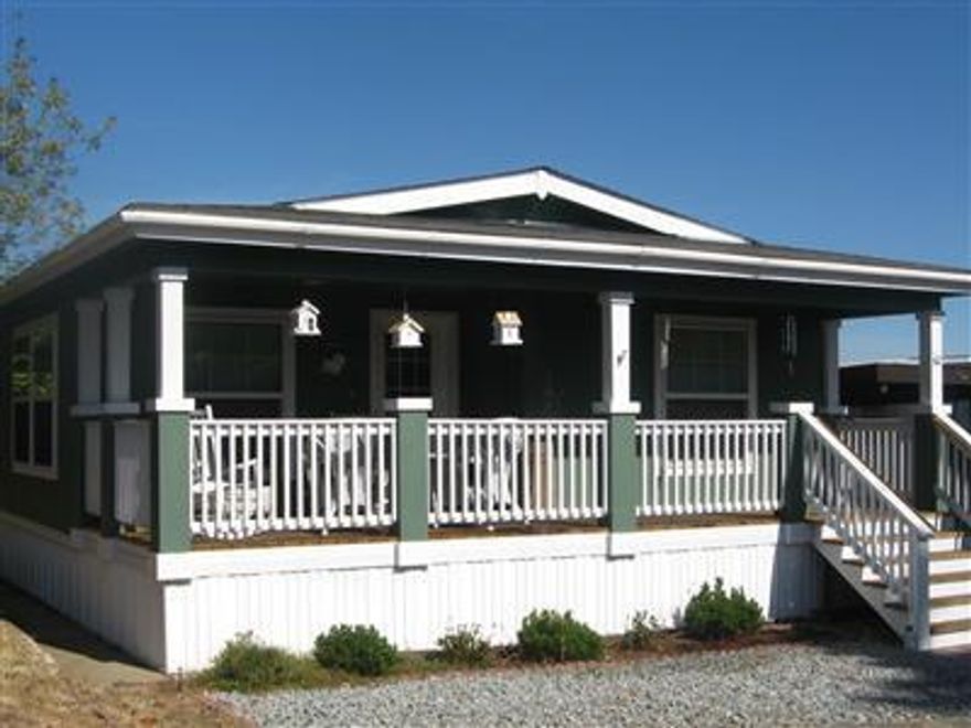 Welcome to Royal Mobile Estates, a 55 plus park nestled in Historic Jacksonville. This Beautiful 2006 Evergreen 40'x 27' home is like new and rarely lived in. There is an orchard over the back fence that gives lots of privacy and has a wonderful front porch for sitting. This home includes : Washer-Dryer, Refrigerator and living room shelving unit. This is a must see home in a great park.