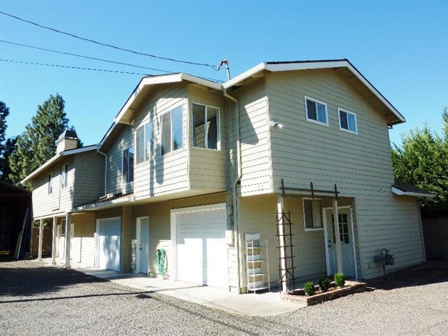 You will find great potential & privacy in this well maintained 2-story home. Located in the heart of Eagle Point, close to city services, this unique home was custom built in 1976 w/ an extensive addition in 2008 including many upgrades. Mostly upper level living w/a chair lift, this home is handicap friendly & offers many living opportunities. Vaulted living room w/laminate flrs, gas fireplace & extensive custom cabinets. Family room off of the main kitchen w/a kitchenette in the rec room. The master bdrm features a private bath w/a slider to a sunny balcony & the guest bdrm looks out over the garden area. Thermo pane windows, central vac system, tile entry, natural gas HVAC, dual hot water heaters, sun room, work shop & 2-oversized single grgs w/openers. This home sits well back off the main road w/parameter fencing, fenced garden area w/raised beds, covered RV parking & abundant storage. Potential for 2-family setup, ADU or room for a caretaker. Buyer to do own due diligence.