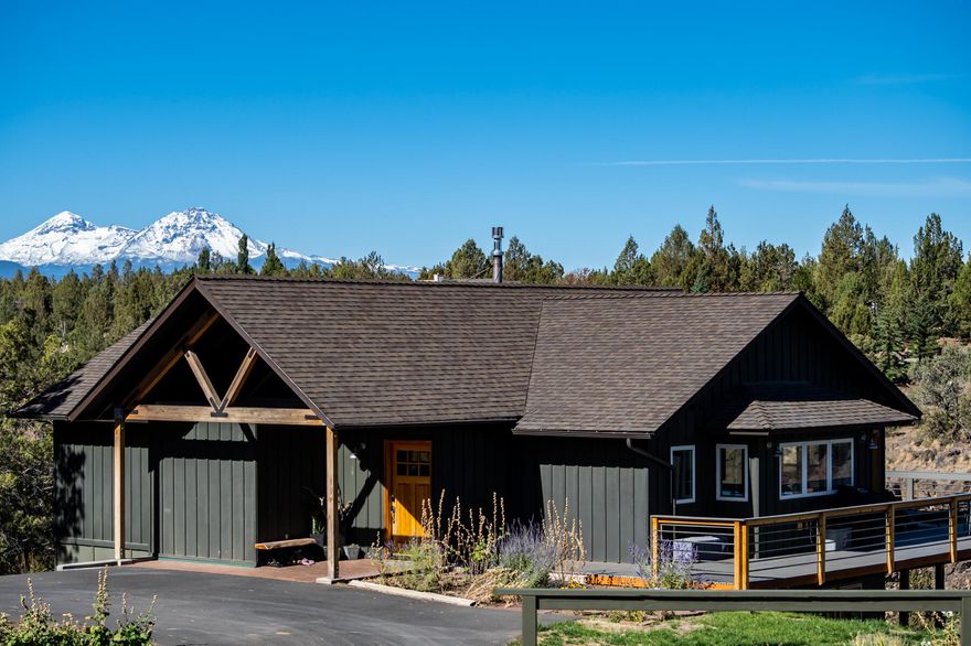 Rare opportunity to own a river front property with cascade mountain views in Tumalo area with direct access to the Deschutes River. Custom built home has vaulted ceilings and is filled with natural light. Evening sunsets can be enjoyed from your deck with the sound of the river providing tranquil background ambiance. There is a path that leads from the back yard down to the canyon floor where you can go for a morning walk or take a refreshing swim in the river. The home has been newly updated and has living space and primary bedroom at the entry level along with a large bonus room and bedrooms in the lower level. Detached 3 car garage provides extra room for your toys, with plenty of RV parking on the side. The home sits off the road and provides a private setting as well as being close to town for shopping or dining out. Come see all this property has to offer.