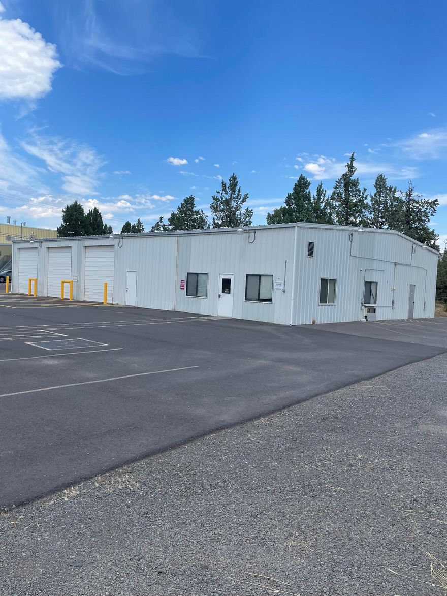 Industrial building in NE Bend with dock high loading, large walk in cooler, and three drive in bays with 12 foot roll up doors. Three phase, 200 amp power throughout. Large .78 acre property welcomes the potential for a fenced off yard area. Building is currently vacant and ready to show. Office area includes two private offices, a large breakroom, and plenty of storage.