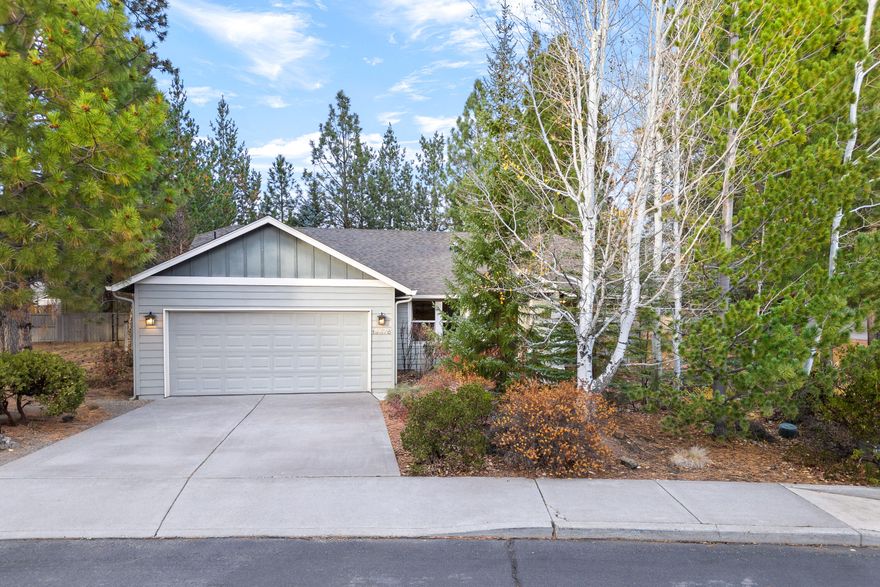 AWESOME New Price Tune-Up! Experience the charm of this inviting single-level home in SW Bend's desirable River Rim neighborhood, offering exceptional privacy. Nestled between two expansive HOA common area open spaces, this property features a beautifully landscaped front yard & a fenced backyard that feels like your own private forest sanctuary, complete w/ a 12x14 deck & tranquil fountain. The kitchen boasts tile counters & floors, stainless steel appliances, & refrigerator.  The floor plan includes a spacious master suite w/ a dual vanity, walk-in closet & excellent separation from the 2 guest bedS.  Additional features include vaulted ceilings, pantry,  2 car garage.  Special New Features: HVAC, Water Heater, Gas Range/Oven & Carpet.  Conveniently located in SW Bend near Brookswood Plaza w/ Grocery store (CE Lovejoys), Restaurants, & More & just a short walk to Wildflower Park, the Deschutes River Trail (hiking, wildlife viewing, fishing), Sunset Hill, & Elk Meadow Elem