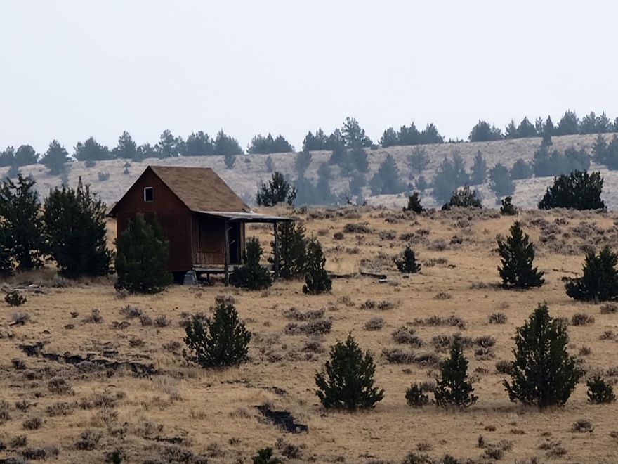Come camp under the stars! Enjoy this wide open 10 acre lot located in Ochoco Land & Livestock. This beautiful property comes with a stunning view of the 3 Sisters mountains, trees for privacy and a genuinely rustic 12 x 16 cabin. Close to BLM land. Deer and Elk frequent the area. Perfect remote getaway.  Enjoy off grid living with nature all around or bring your ATVs! There are so many memories waiting to be made on this little piece of heaven.