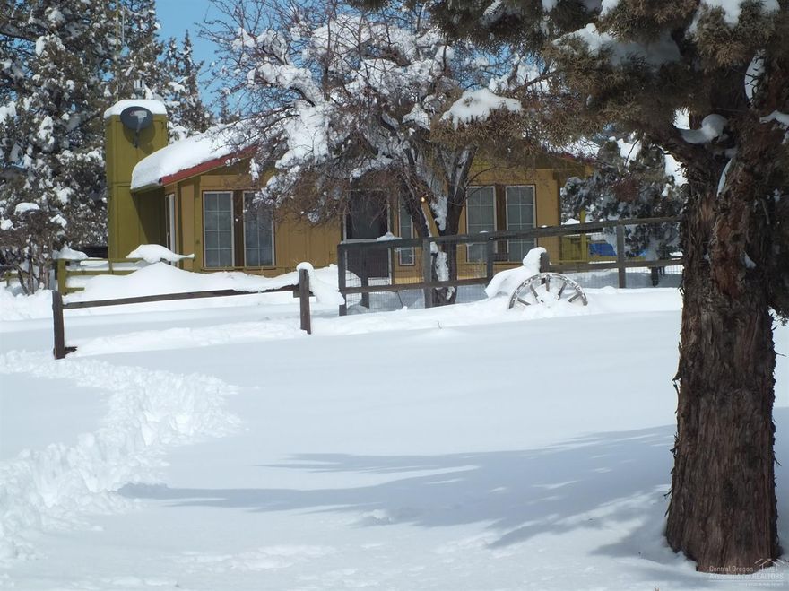 Get out of the city and into this adorable well cared for home sitting back from the road, feels like an oasis that affords a wonderful view. It feels spacious and has everything you need to live or vacation comfortably. The kitchen appliances & water heater are newer. You can cozy up to the propane fire and enjoy your favorite pastime while watching the flame. The nice 3 bay 1312 sqft shop supplies plenty of space for toys & hobbies. Bring your pets, they will be safe in the fenced back yard. Very conveniently located. Crooked River Ranch offers plenty of activities, views & wildlife.