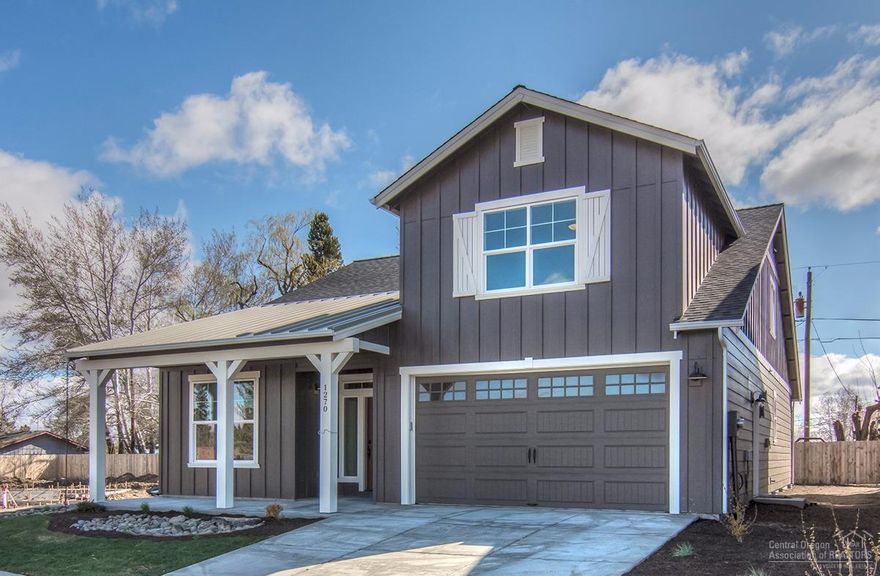 The Jones Farm neighborhood by Stonebridge NW includes Earth Advantage certified homes conveniently located in mid-town, just blocks from Hollinshead Park. This contemporary farm house style home features hardwood flooring, gas fireplace, main level office & master suite. Open floor plan with cooks kitchen, oversized island & corner pantry, with SS appliances. This home also comes with a covered back patio, tankless water heater and 220 plug in the garage for your electric car.