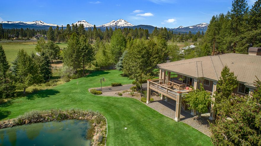 Spectacular custom home on 10 acres with Cascade Mountain and Indian Ford Creek meadow views. Gated, with end of road privacy yet less than 2 miles to Sisters shops and restaurants. The primary living space is 4,346 sf and features 10' ceilings, wide hallways and large spacious rooms. In addition, there is over 1,000 sf of bonus space, including a game/exercise room, kitchenette and movie theater with wood burning stove. Home features a chef's kitchen w/granite countertops, an elevator, stone fireplace, dumb waiter, wrap around decks, zoned heating, there is absolutely too much to list. If the 1,700 sf attached garage does not suit your needs, there's also a 66 X 42 heated, finished shop with 14' ceilings, 10'x12' and 16'x12' overhead doors, 400 amp service, plumbed half bath and office space. Includes 2 high producing, private wells that are interconnected to make up one very capable water system. Lastly, the property is Zoning RR10 so an Auxiliary Dwelling Unit (ADU) may be allowed.