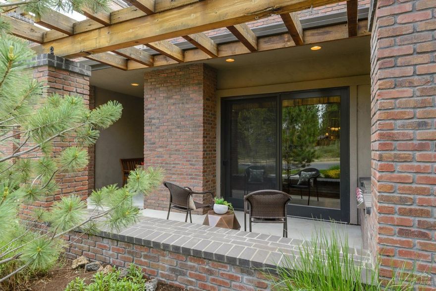 Elegant NW Contemporary townhome in NW Crossing! Live and play just blocks from dining, shopping, parks, trails, and schools. 2977 SF of high end craftsmanship. Reclaimed wood floors, commercial stainless kitchen, large living spaces. Three elegant bedrooms all en suite, offering private heated paver patios. Loft, flex space for home office or workout area. Oversized two car garage. Outdoor patio with built in gas BBQ for entertaining. Situated across from Compass Park! Lifestyle living in Bend!